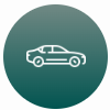 A white line drawing of a car sits within a teal circle, illustrating the driving directions to Dumfries Hearing Clinic.