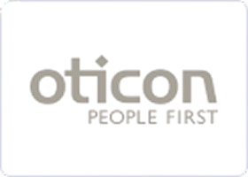 Pale Oticon lettering and the “PEOPLE FIRST” slogan stand out on a dark rectangular sign for the hearing technology brand.